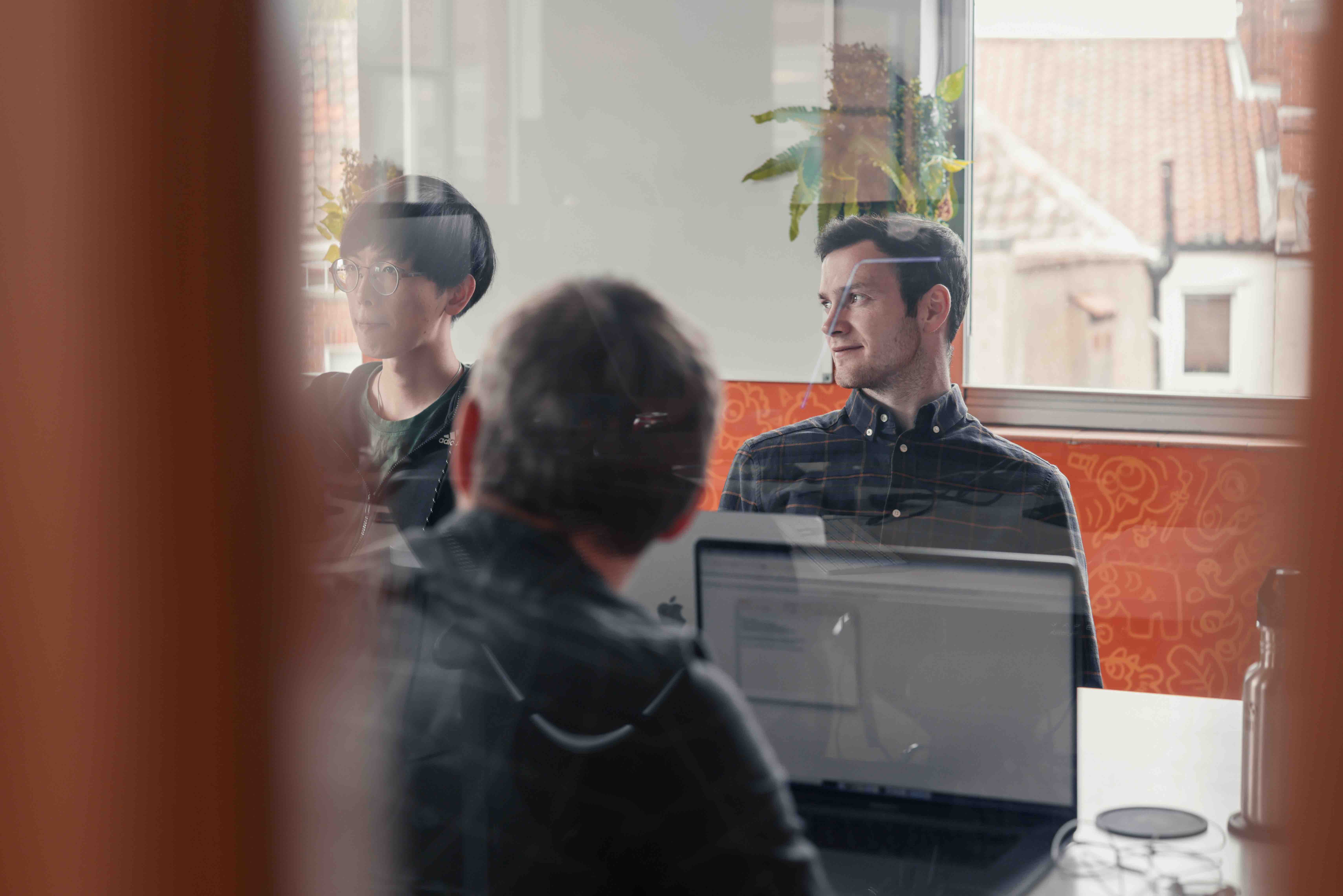 Photo of the Brew team in a meeting